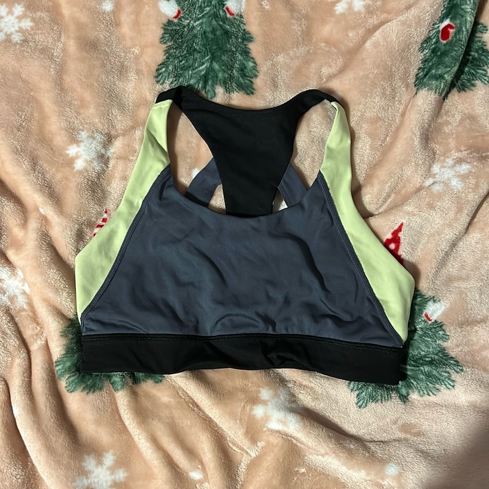 cute sports bra with detailed back! Size small